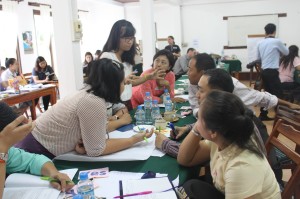 This photo when I was translating from English to Lao language to Burmese and Laotian trainers (1)